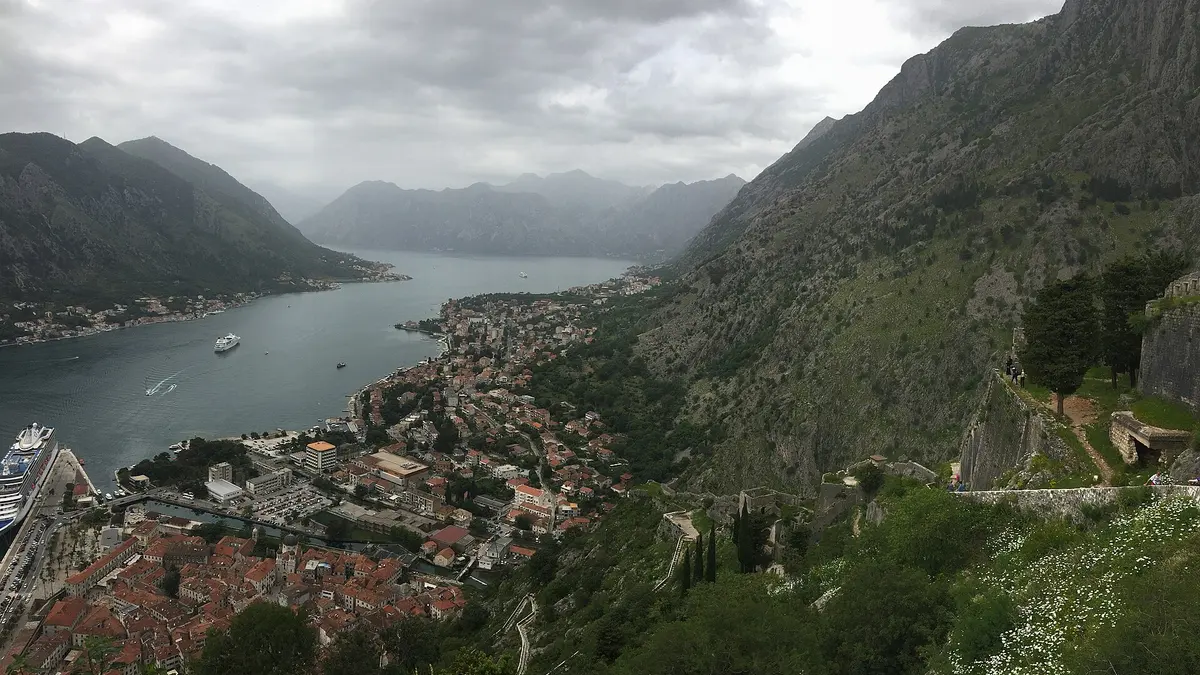 The town of Kotor and its harbour below the fortress walls climbing the mountain