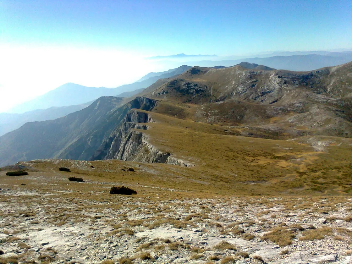 The snowy conical peak of Solunska Glava in the Jakupica range under clear sky