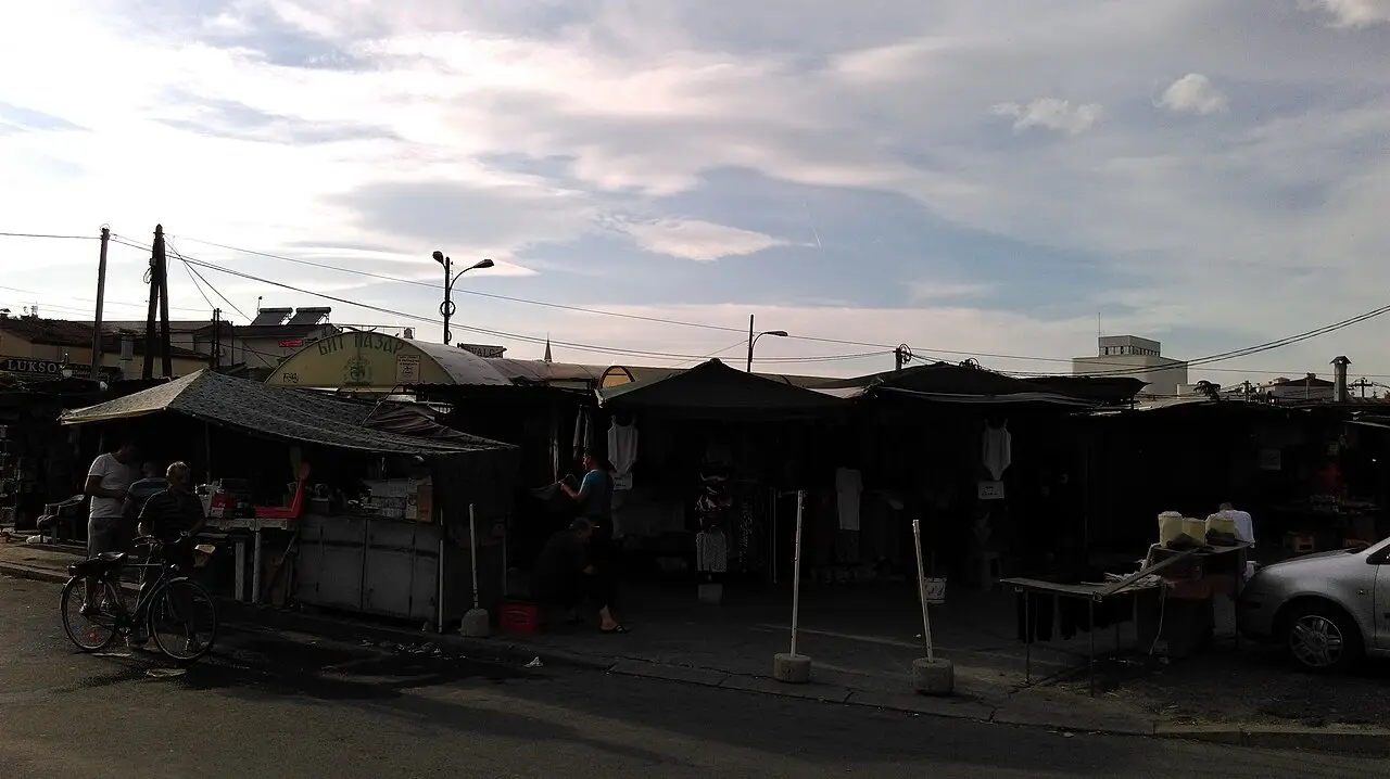 Covered stalls and shoppers at Bit Pazar market on the edge of Skopje Old Bazaar
