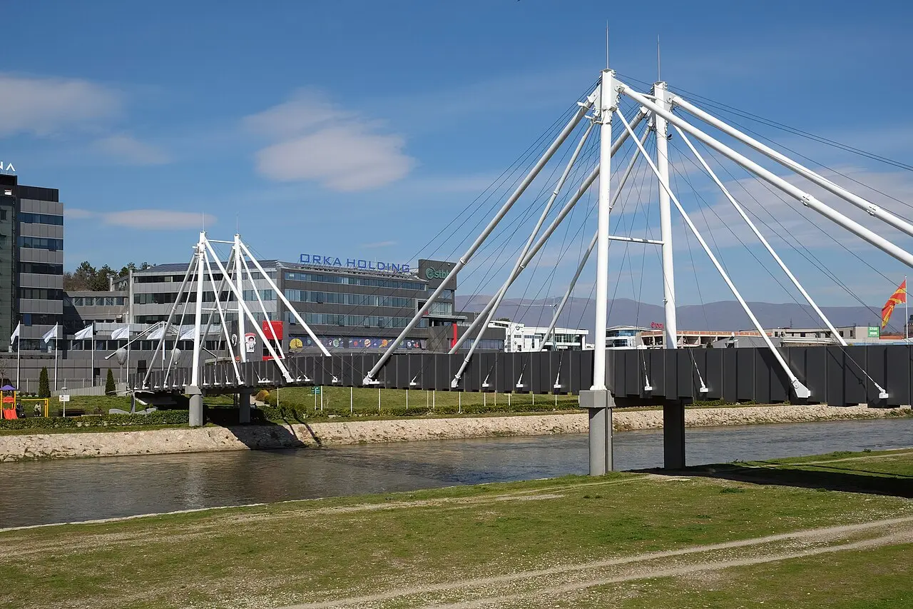 Modern pedestrian bridge crossing the Vardar river in central Skopje