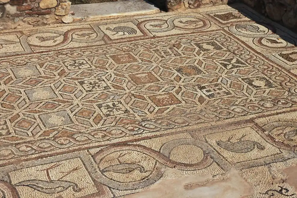 Excavated walls and mosaic floors of Heraclea Lyncestis under open sky south of Bitola