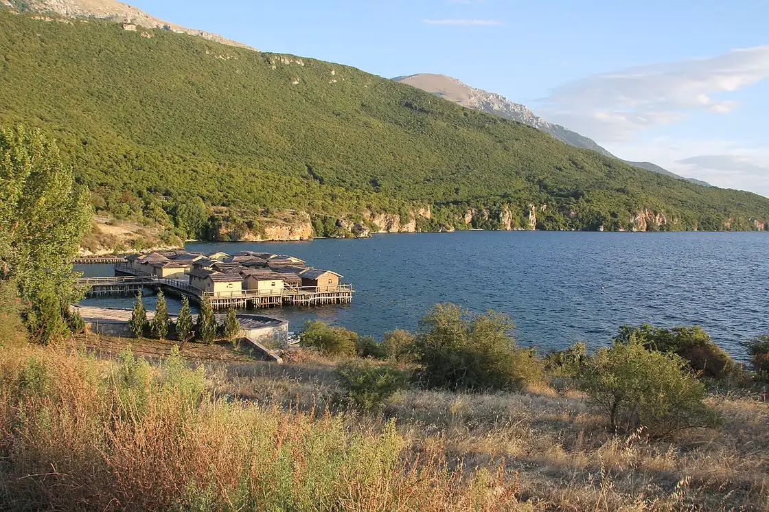 The reconstructed prehistoric stilt-house settlement Bay of the Bones on the water of Lake Ohrid