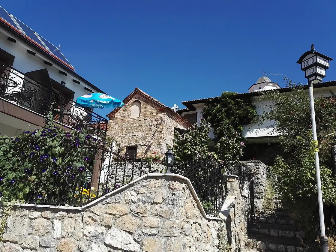 A cobbled lane of old stone-and-timber houses in Ohrid old town