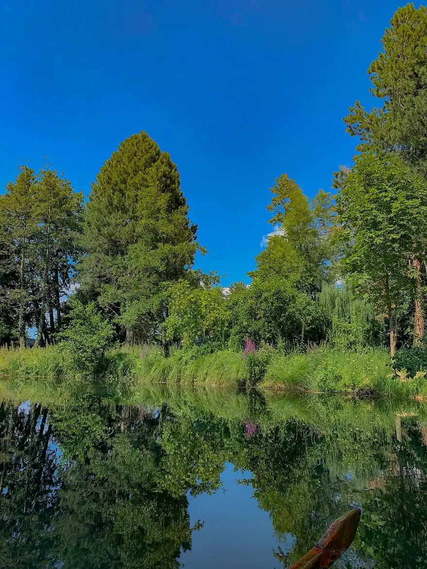 The calm water of Lake Ohrid seen from the shore at Pogradec, Albania