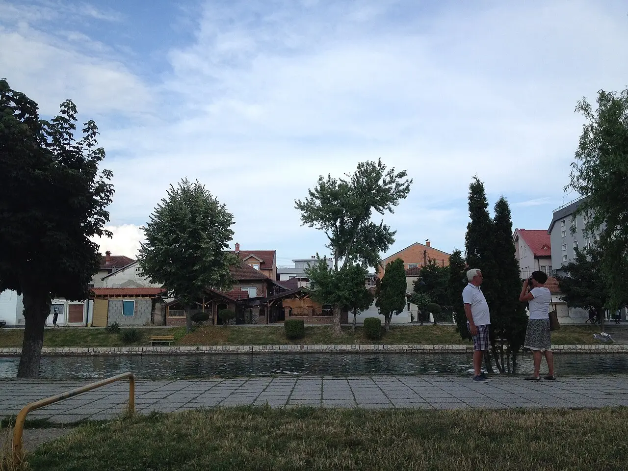 An ornate footbridge over the green Black Drin river in Struga