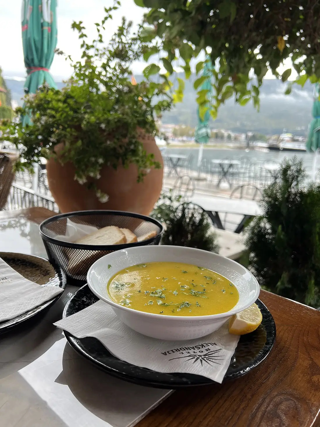 Bowl of fish soup labeled in Cyrillic on a table in Ohrid