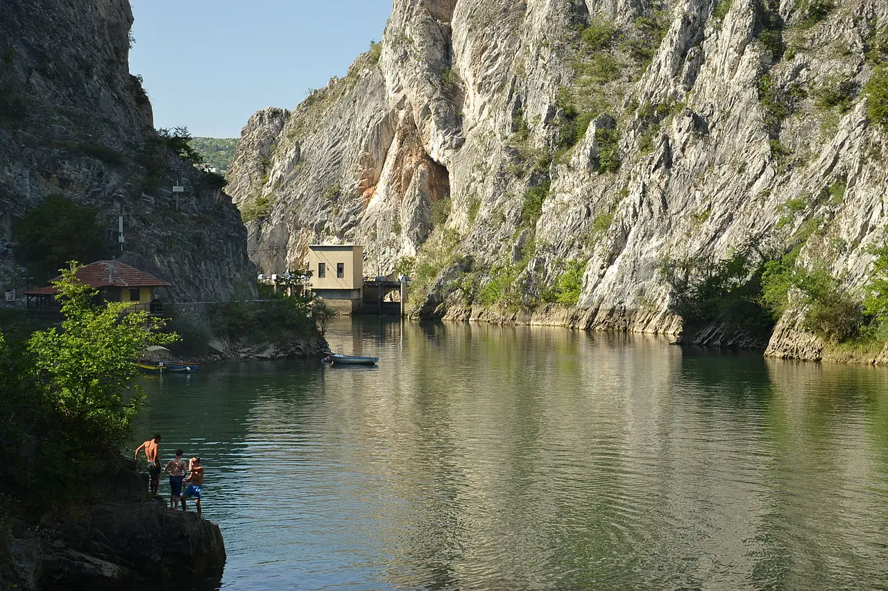 The dam, jetty and moored boats at the entrance to Matka Canyon near Skopje