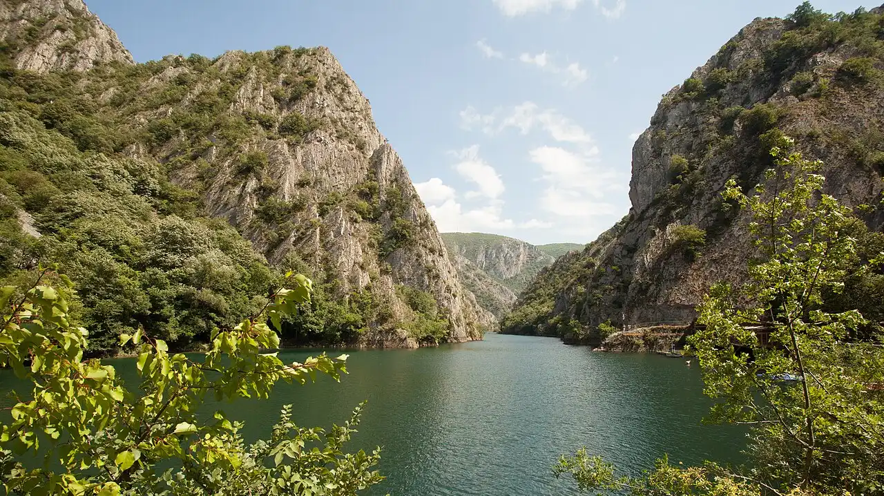The cliffs and green water of Matka Canyon and its reservoir near Skopje