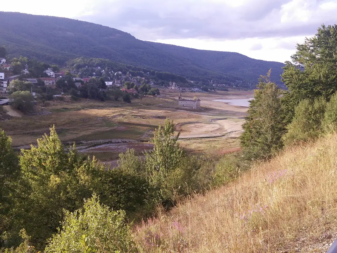 The forested hills and reservoir of Mavrovo National Park in the western highlands