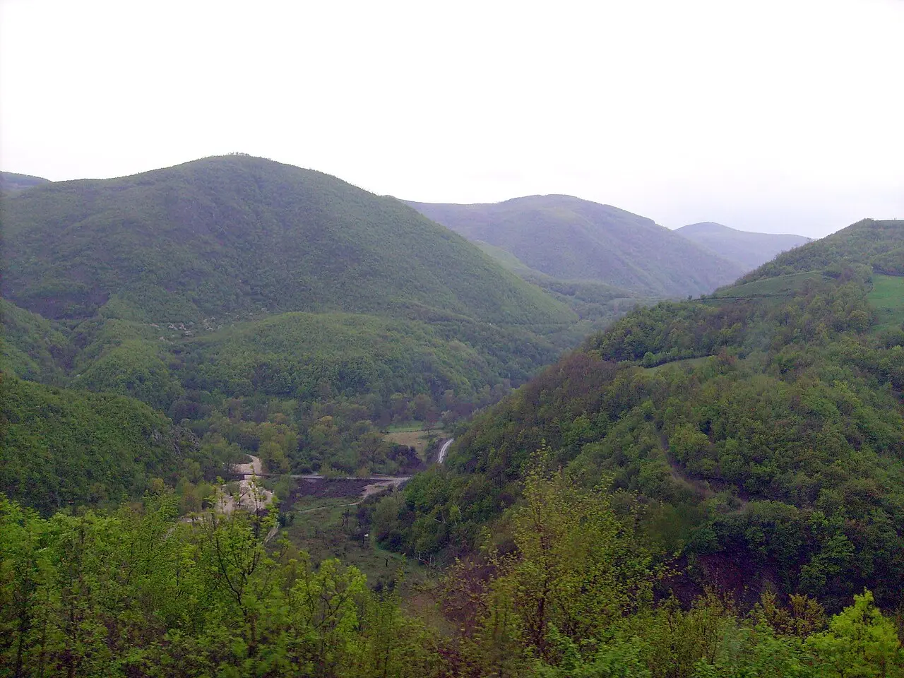 Green hills either side of a valley in the Elez Han border region between Kosovo and North Macedonia