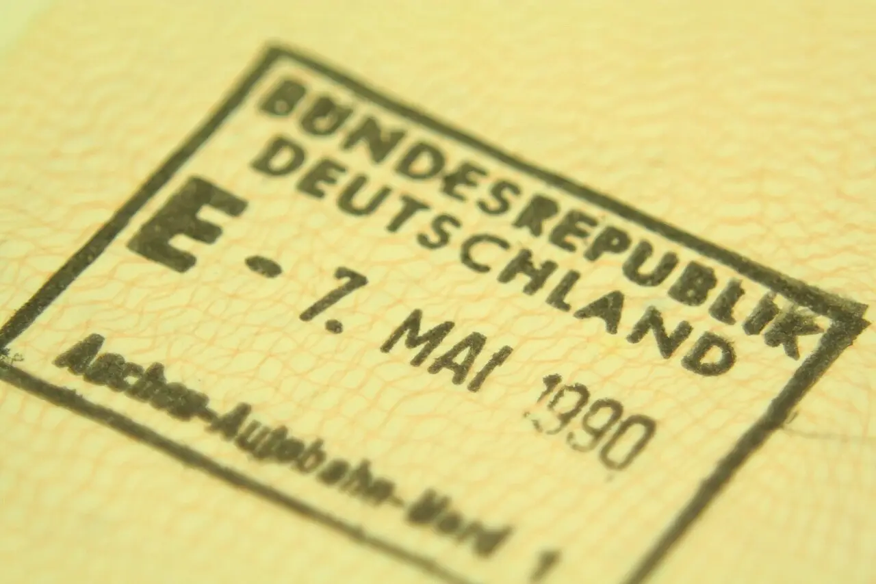 A close-up of a European entry stamp in a passport