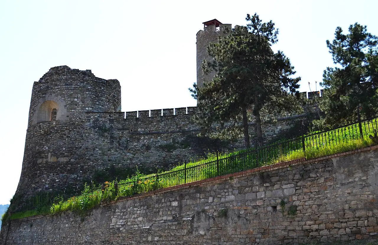 The stone walls and gate of Skopje's Kale fortress overlooking the city