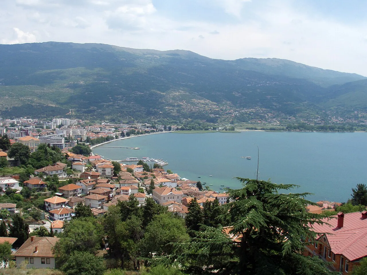The rooftops and churches of Ohrid old town descending to Lake Ohrid
