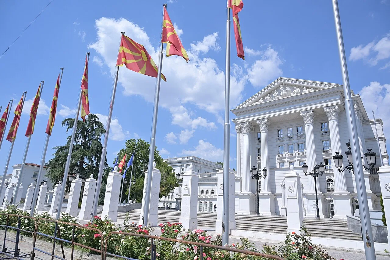 Government headquarters building in Skopje under a clear sky, seat of the state administration that writes North Macedonia tax law