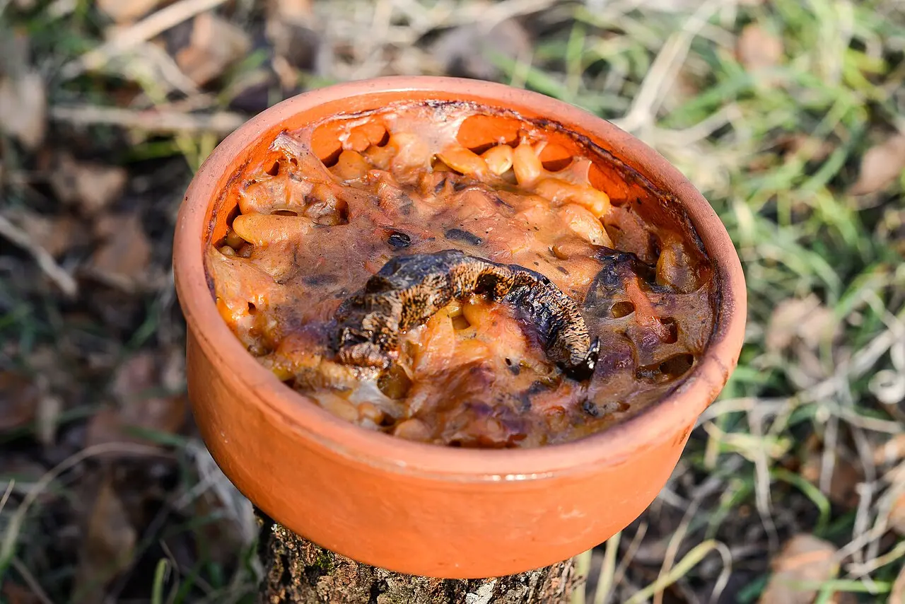 Tavče gravče, oven-baked beans, served in a traditional clay pot
