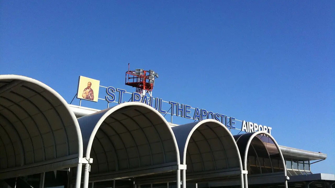 The arched terminal of St. Paul the Apostle Airport in Ohrid against a clear blue sky