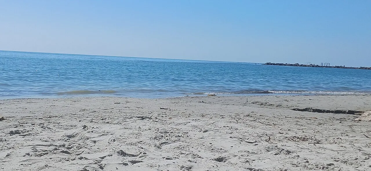 The Adriatic sea meeting the shore at Currila beach near Durres, Albania