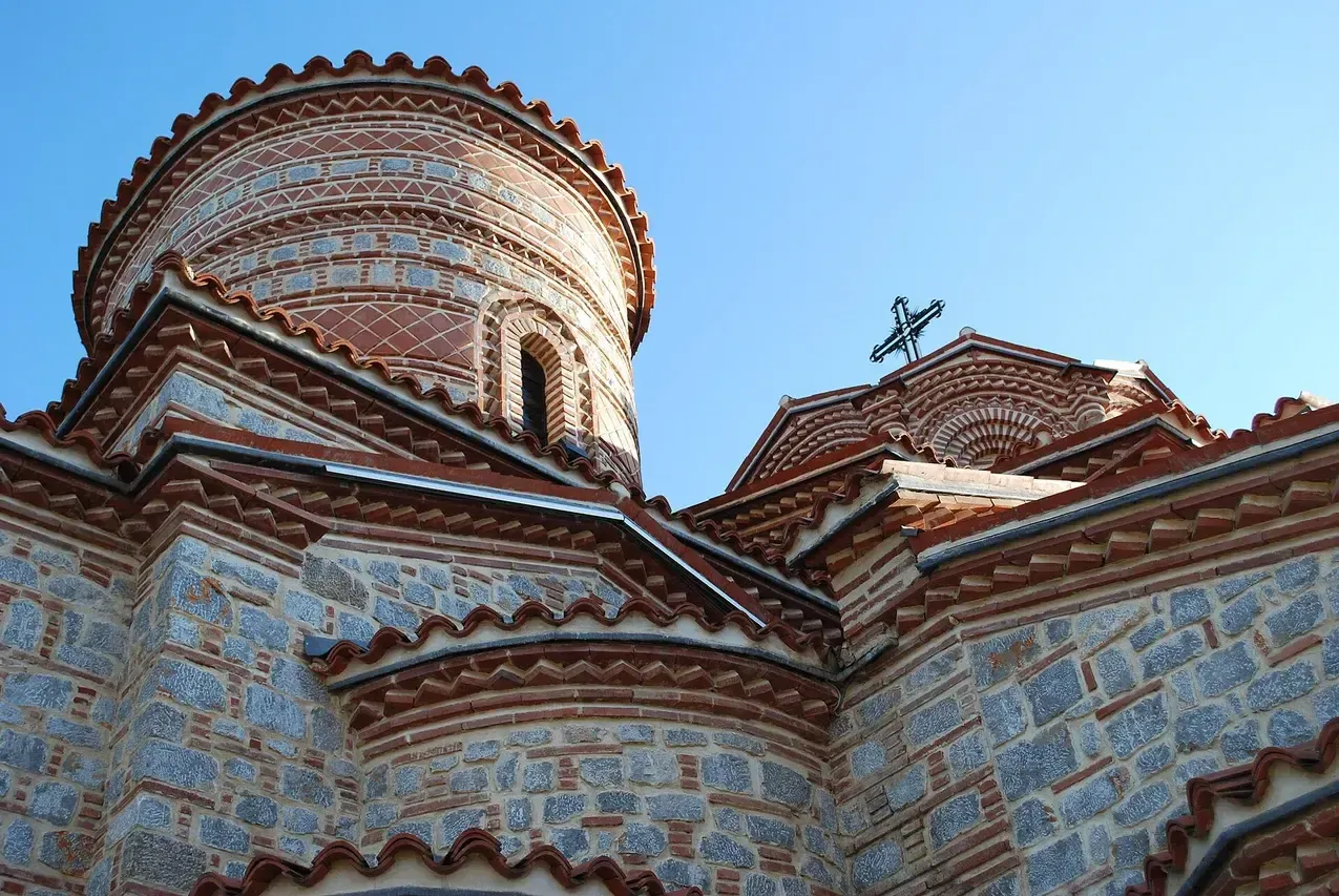 The domed Church of Saints Clement and Panteleimon on Plaošnik with excavated walls in the foreground