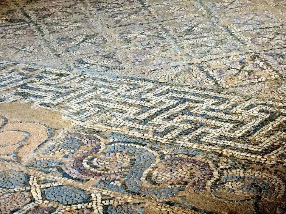Colourful early Christian mosaic floor with animal and plant motifs in the Plaošnik baptistery