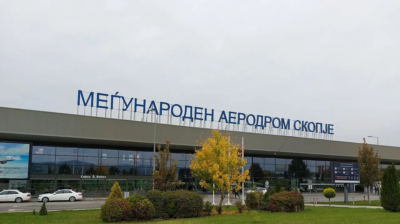 The terminal building of Skopje International Airport with its Macedonian-language sign
