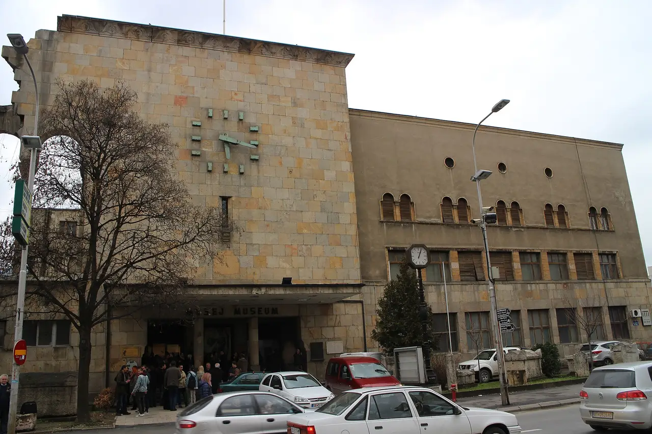 The old Skopje railway station building, now the Museum of the City of Skopje, with a memorial clock on the facade