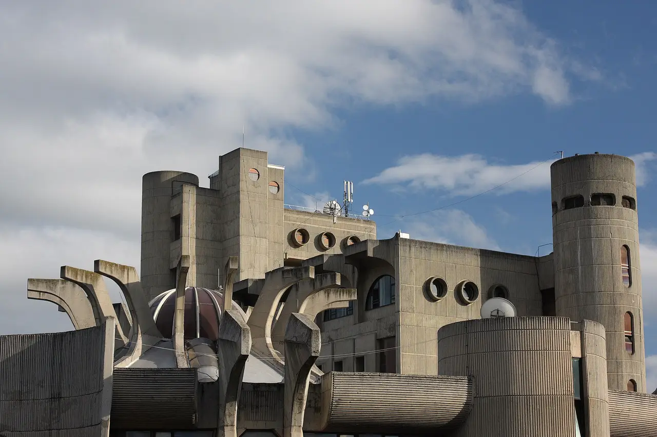 The circular concrete Counter Hall of Skopje's central post office seen from the riverbank
