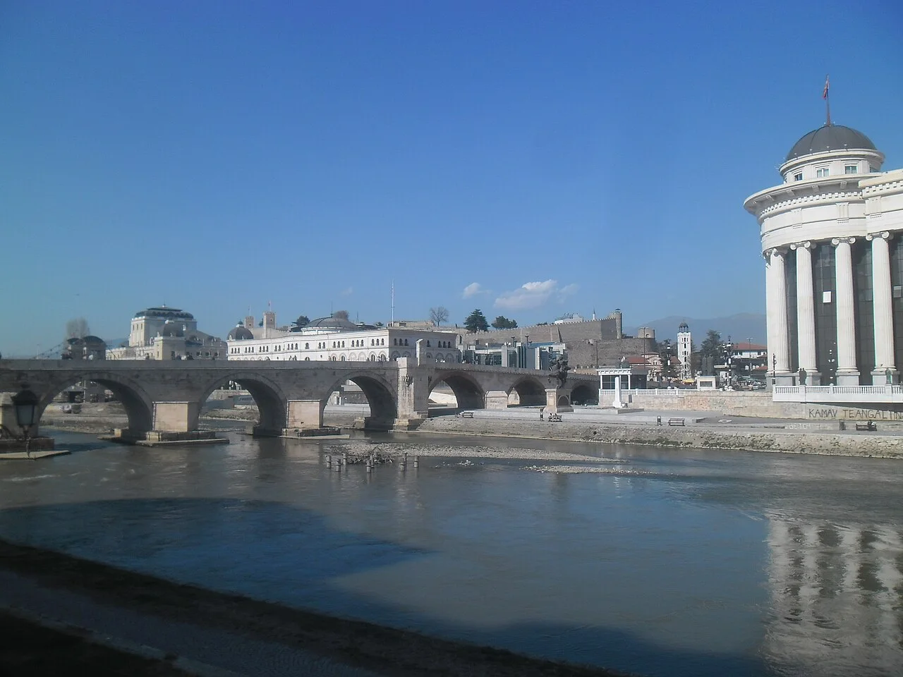 The Ottoman Stone Bridge over the Vardar in Skopje with the Kale Fortress on the hill behind