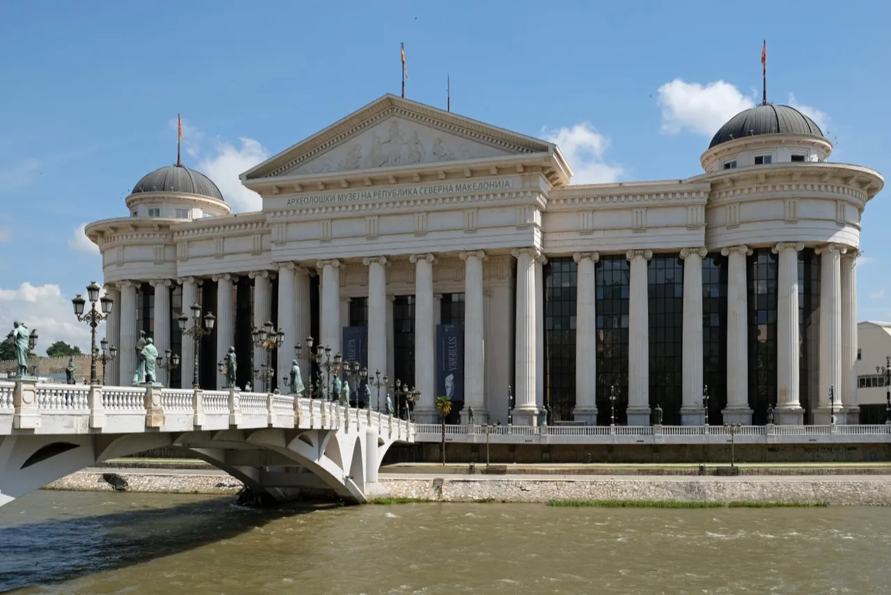 The Bridge of Civilizations leading to the Archaeological Museum beside the Vardar in Skopje