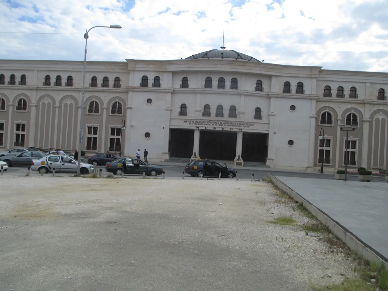 The domed neo-Baroque building of the Museum of the Macedonian Struggle beside the Vardar