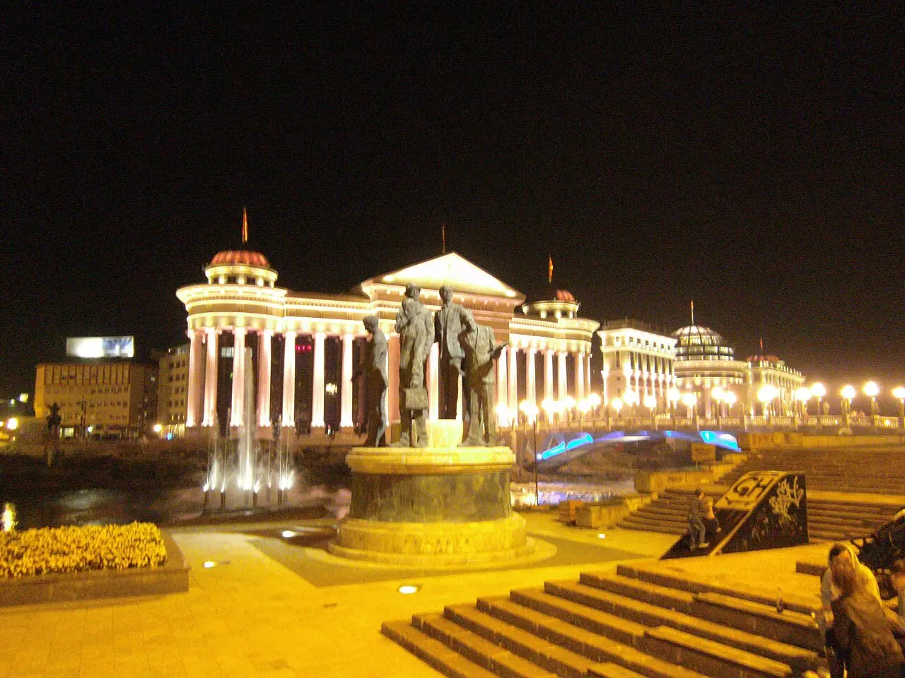 Floodlit fountains along the Vardar riverside in Skopje at night