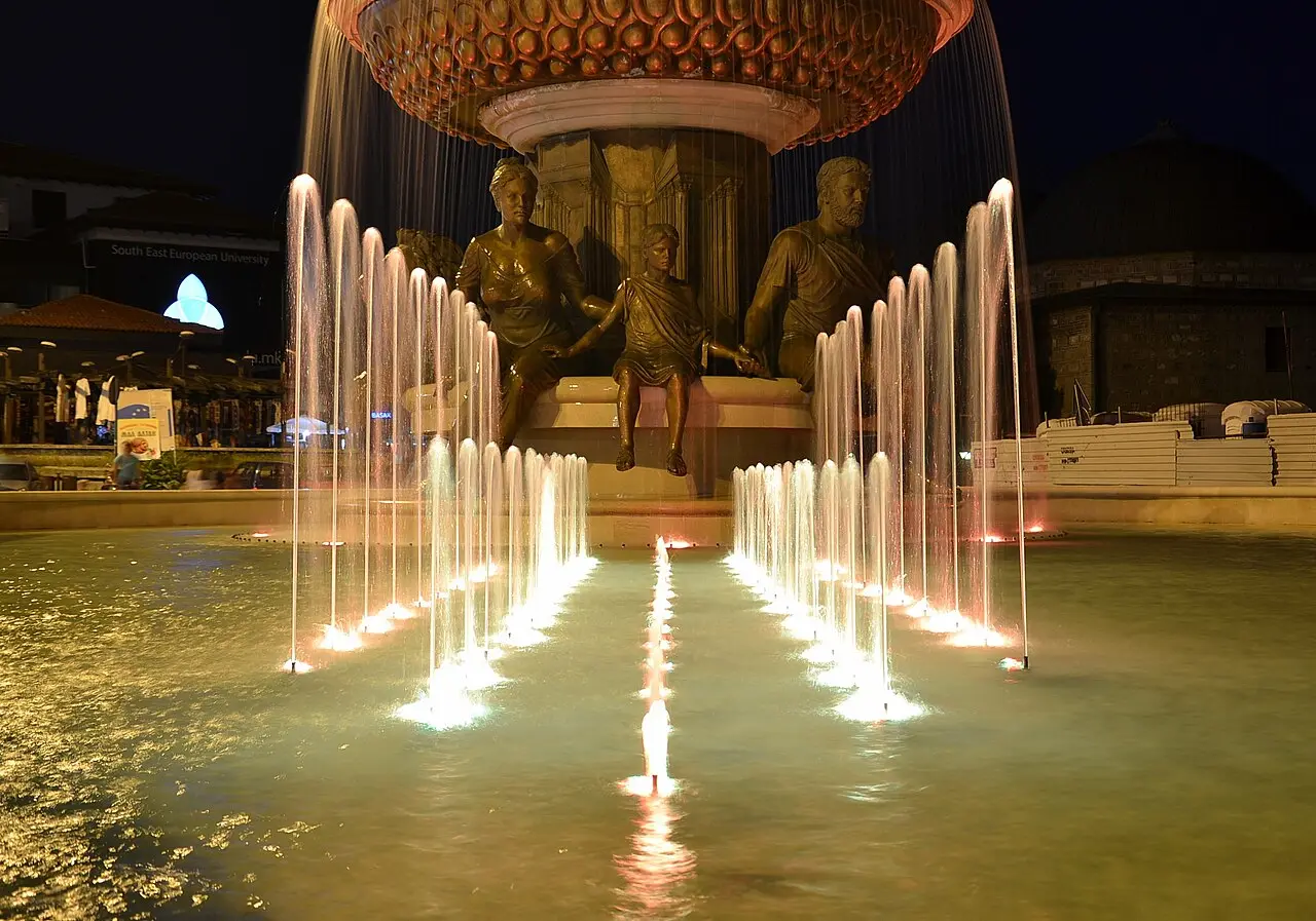 The Warrior on a Horse fountain in Skopje illuminated after dark