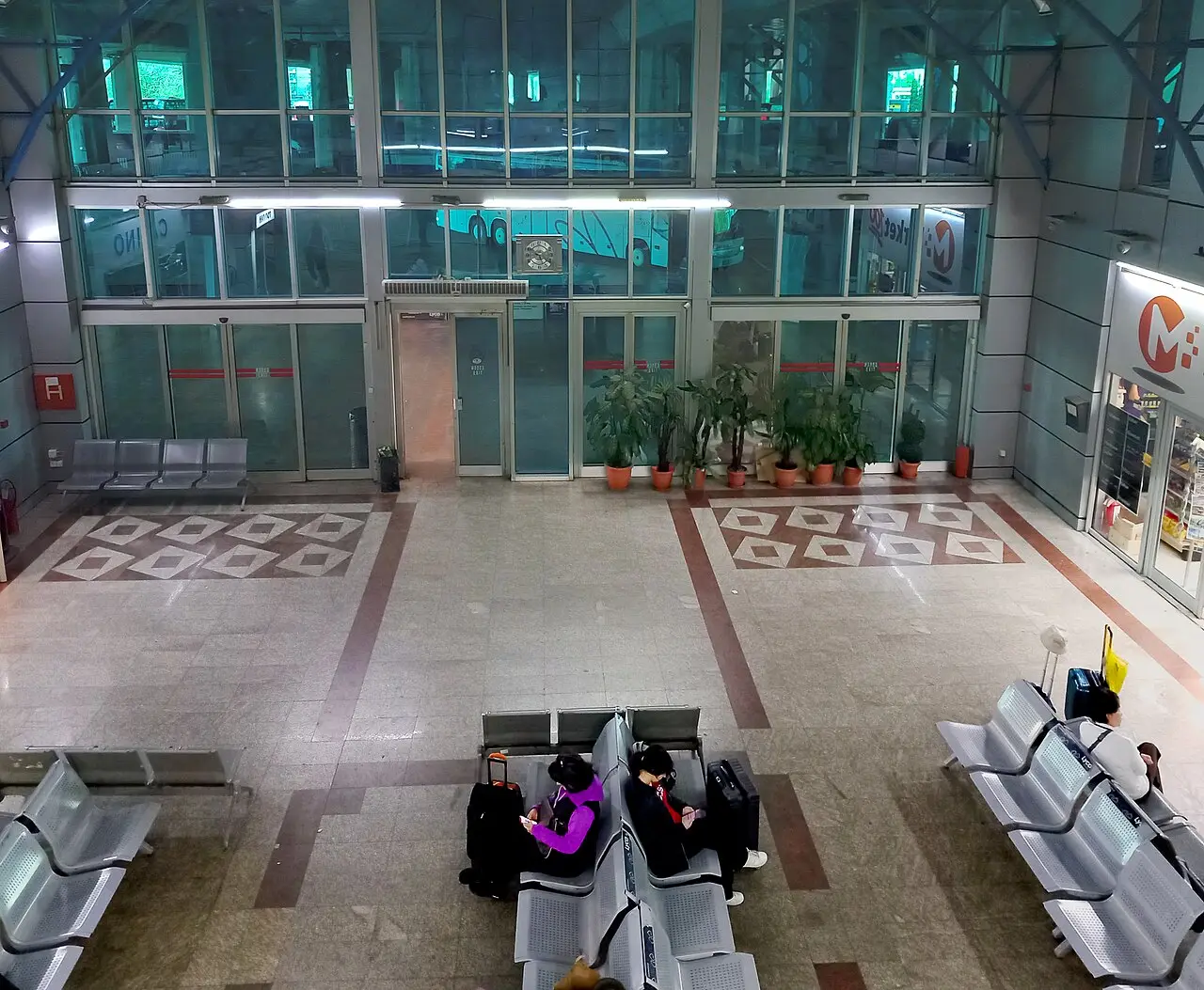 Coach platforms at Skopje's international bus station under the concrete deck