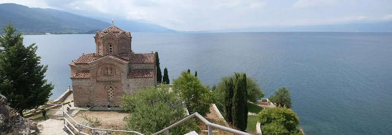 A wide panorama of Lake Ohrid and the town seen from the Kaneo headland