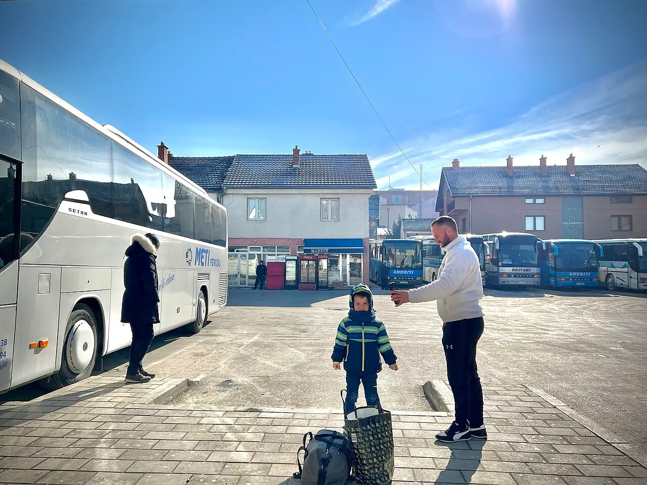 Coaches parked at the bus station in Ferizaj, Kosovo, on the road between the Macedonian border and Pristina