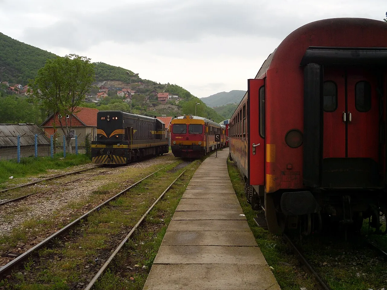 Railway carriages and shunting locomotives standing at Hani i Elezit station on the Kosovan side of the border