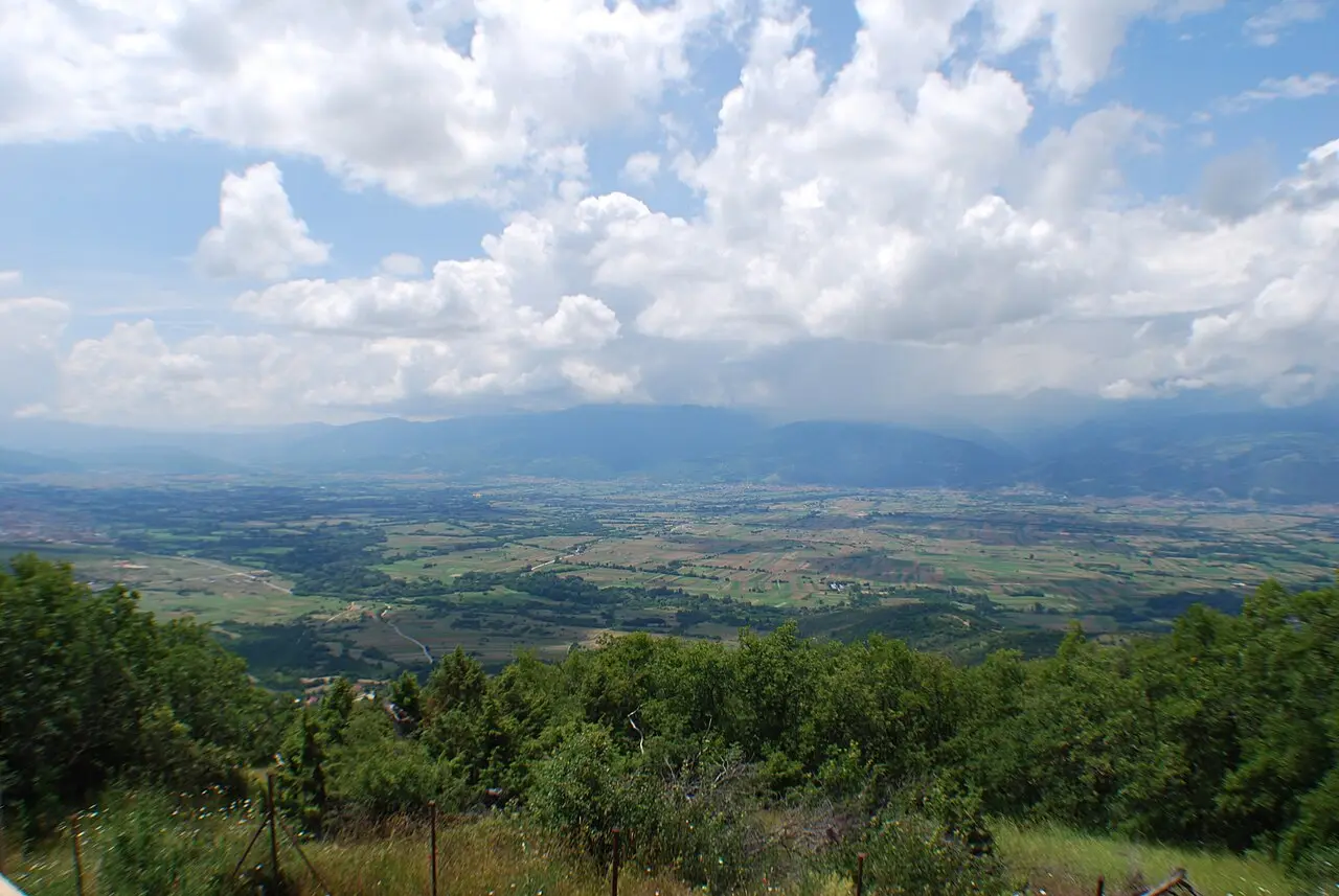 The wide Polog valley with fields and distant ridges, the basin Tetovo sits in west of Skopje