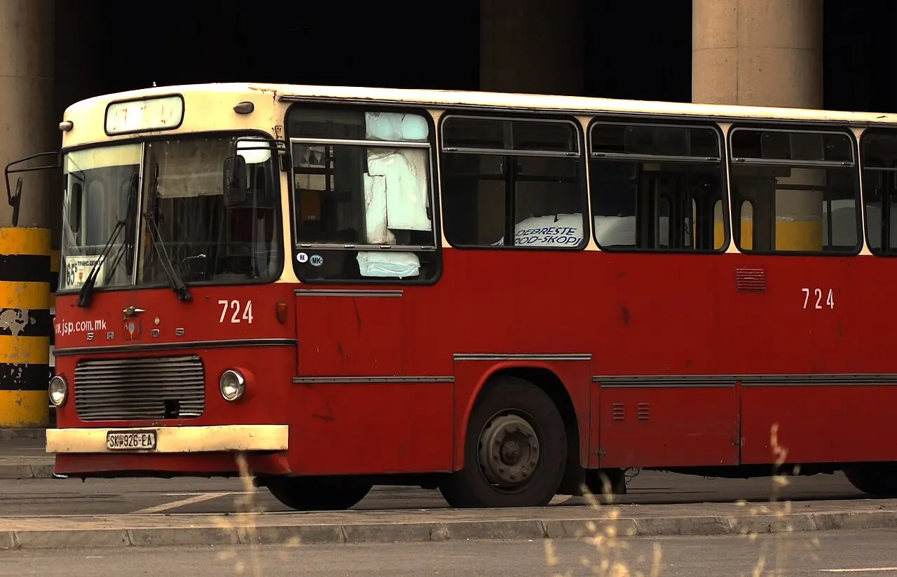 An intercity coach parked beside a rural road in North Macedonia