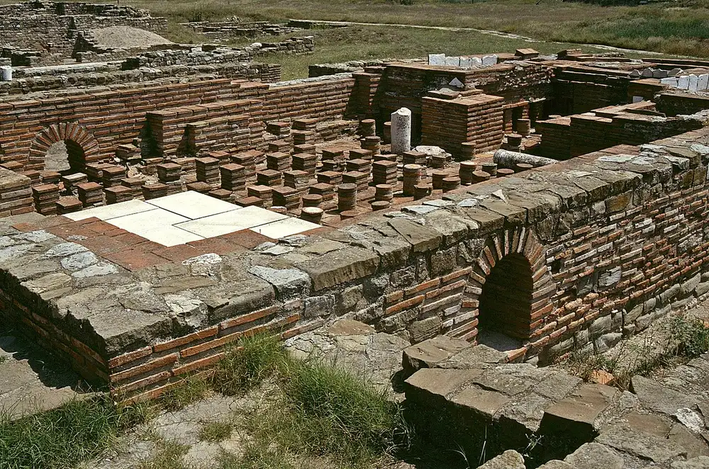Rows of small brick pillars from the underfloor heating system of the Large Bath at Stobi