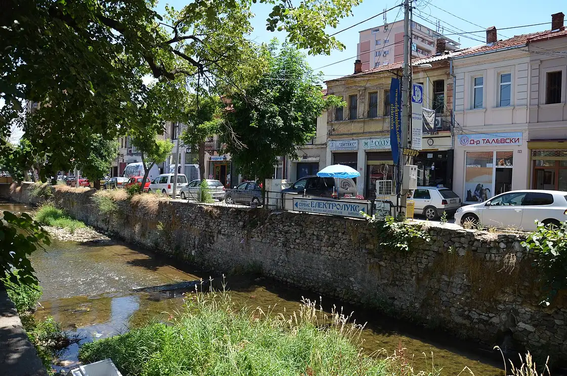 The Dragor river running through central Bitola, lined by old buildings and shops