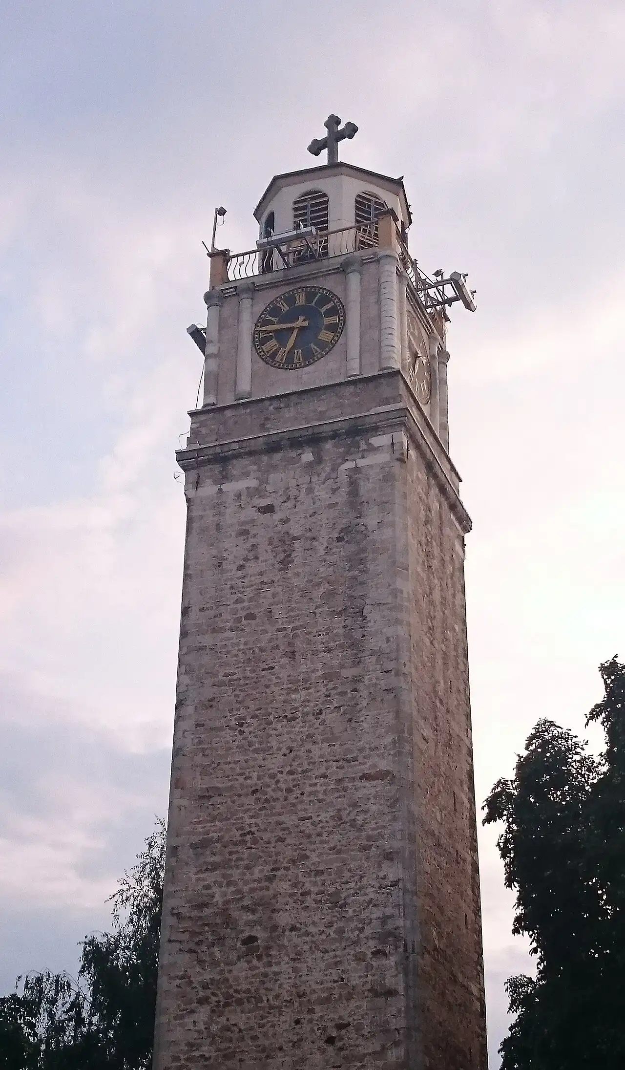 The tall stone Saat Kula clock tower of Bitola against a blue sky