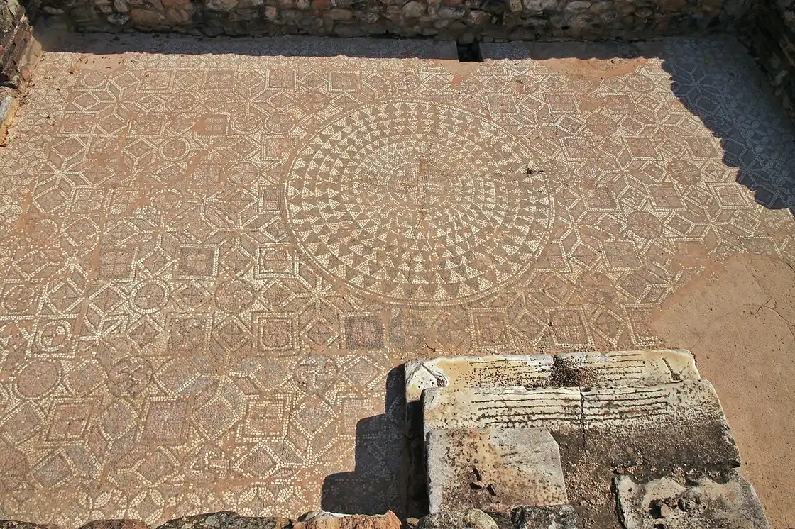 Intricate geometric and circular floor mosaic at Heraclea Lyncestis near Bitola