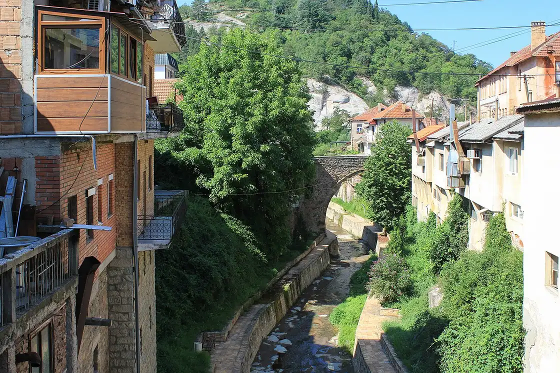 Old houses clinging to the sides of the rocky gorge that runs through the middle of Kratovo