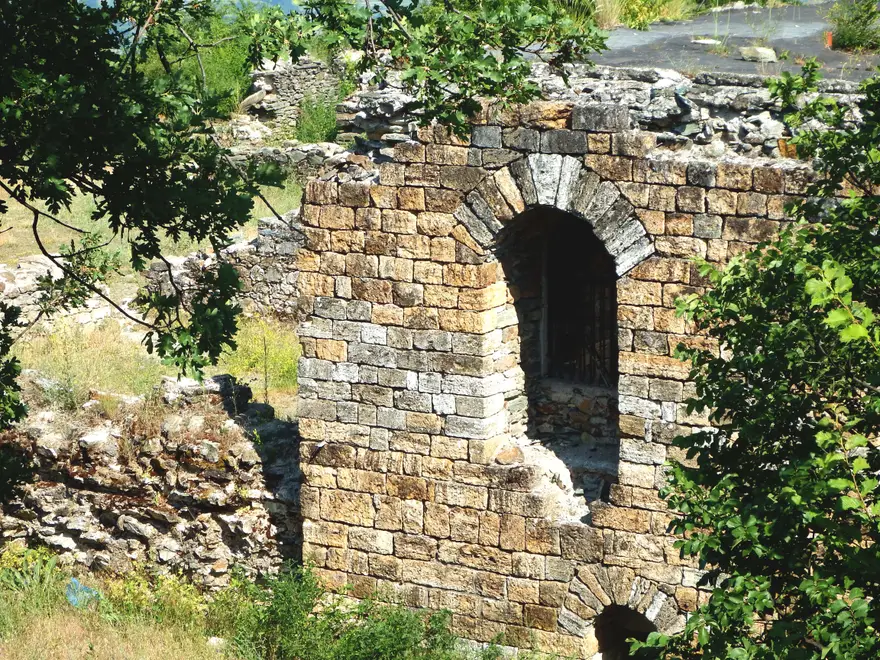 A surviving stone arched gateway in the ruined walls of the Kale fortress above Tetovo