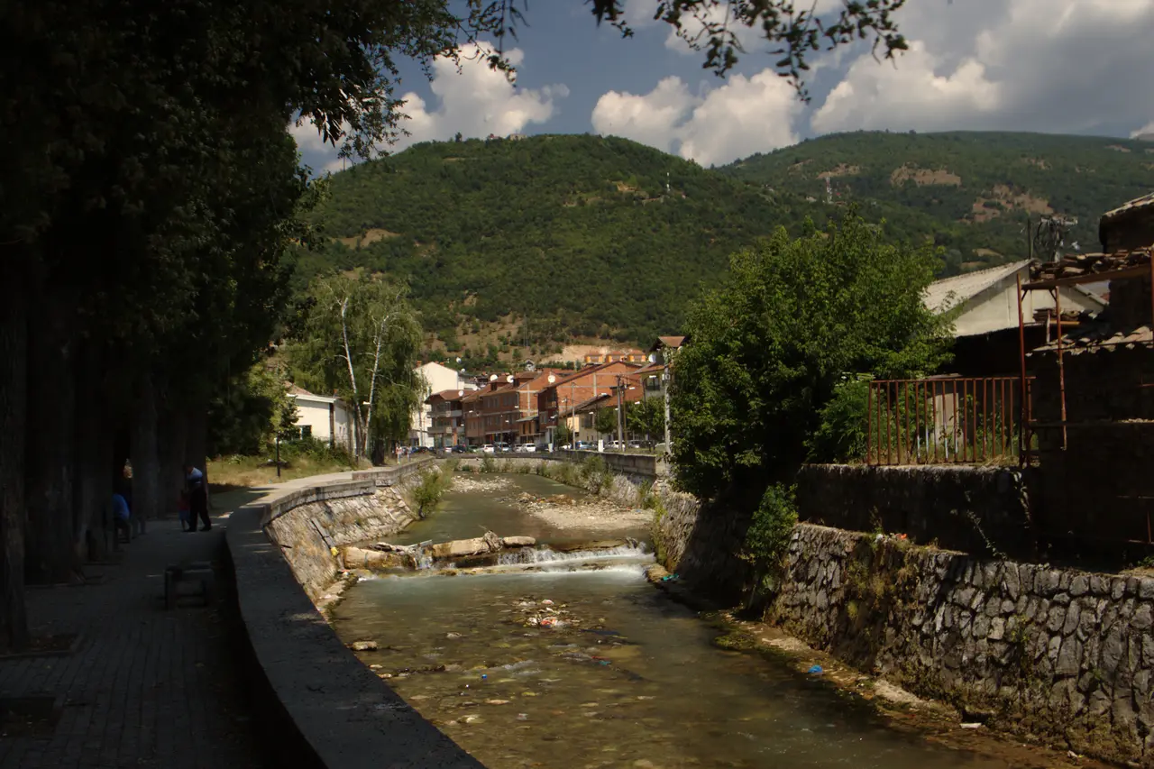 The Pena River running through the centre of Tetovo past riverside buildings